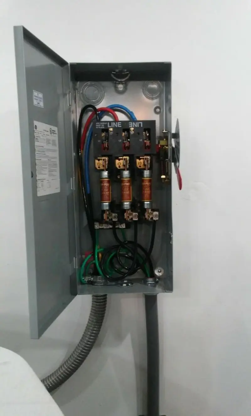 Three-phase disconnect switch installed for Smoke Detector Installation in Bryan